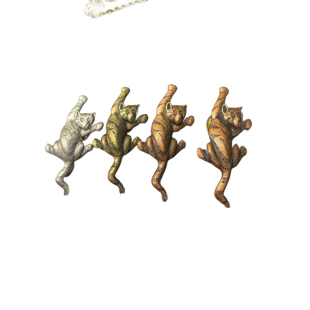 4 1988 Jonette Jewelry (JJ) cat brooch different tones